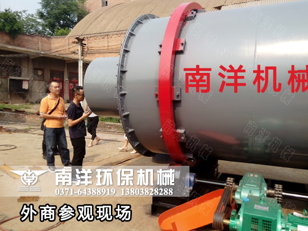 外（wài）商參觀烘幹機（jī）成品區